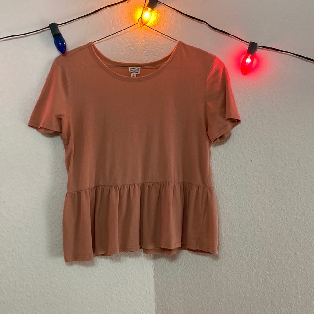 Pink ruffled blouse